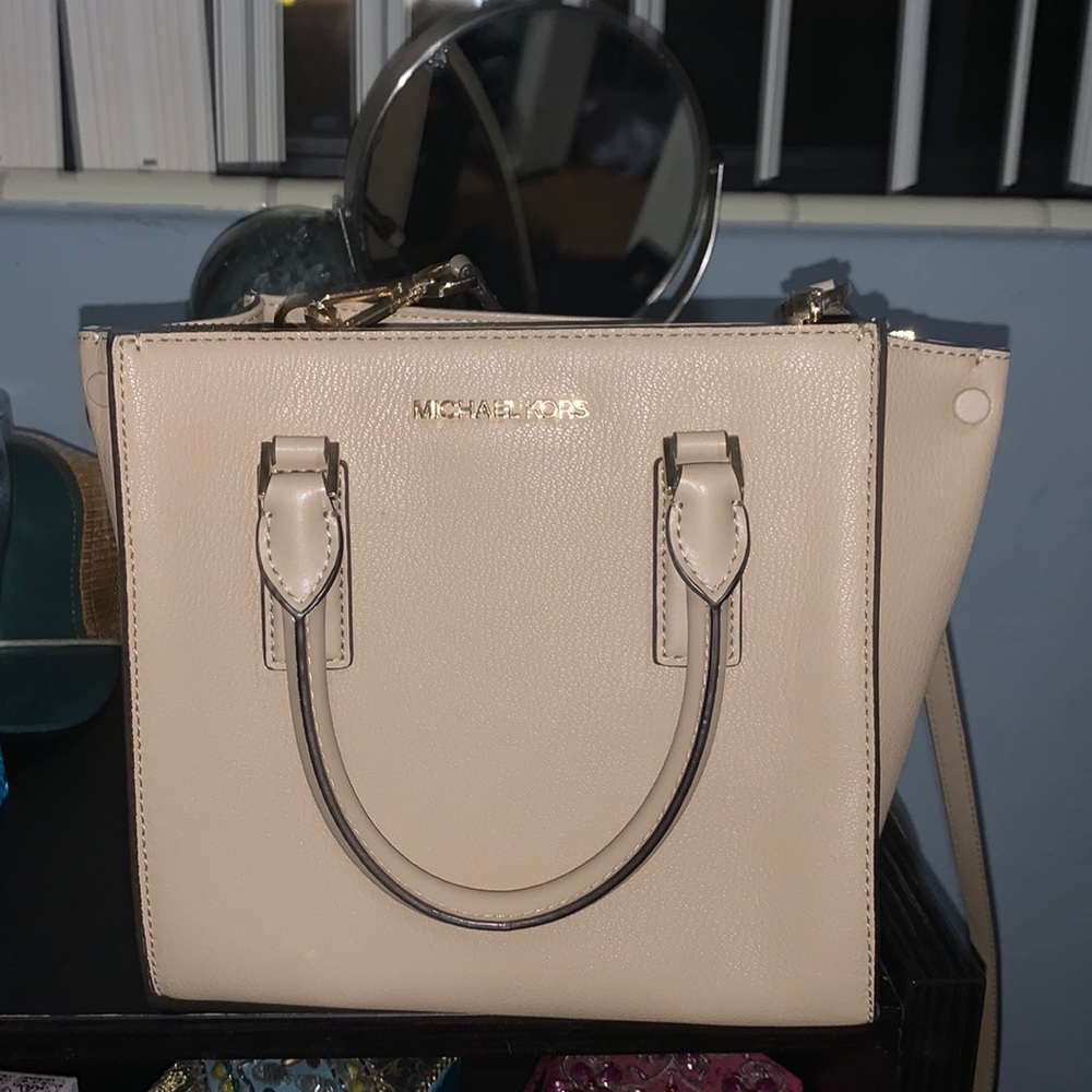 The bag is cute but I’m not in love with it. Feel free to ask any questions